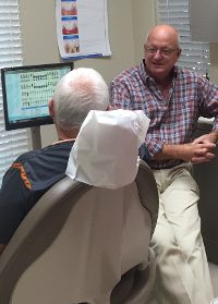 Dr. Cooksey providing gentle dental care to a patient
